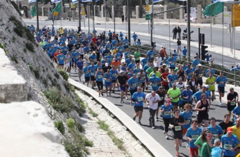 Runners push on in Jerusalem marathon 390