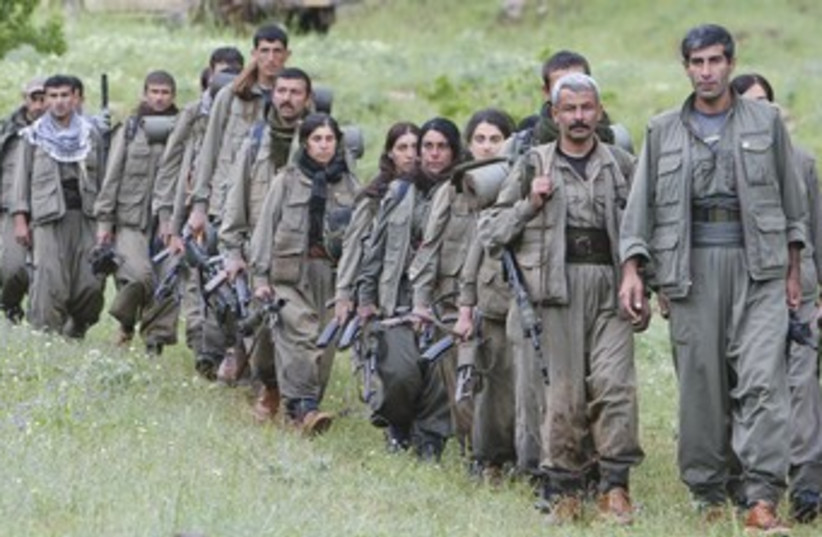 Kurdish PKK workers marching 370 (credit: Azad Lashkari /Reuters)