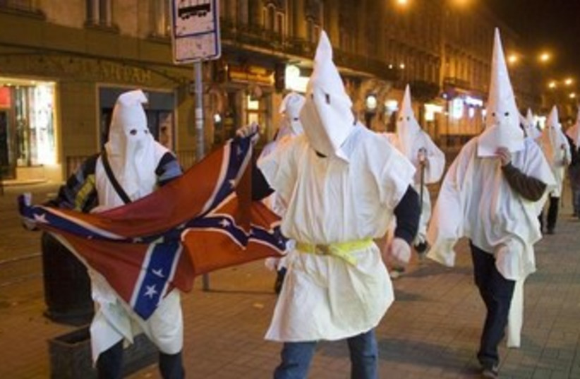 KKK members 370 (photo credit: REUTERS/Vasily Fedosenko)