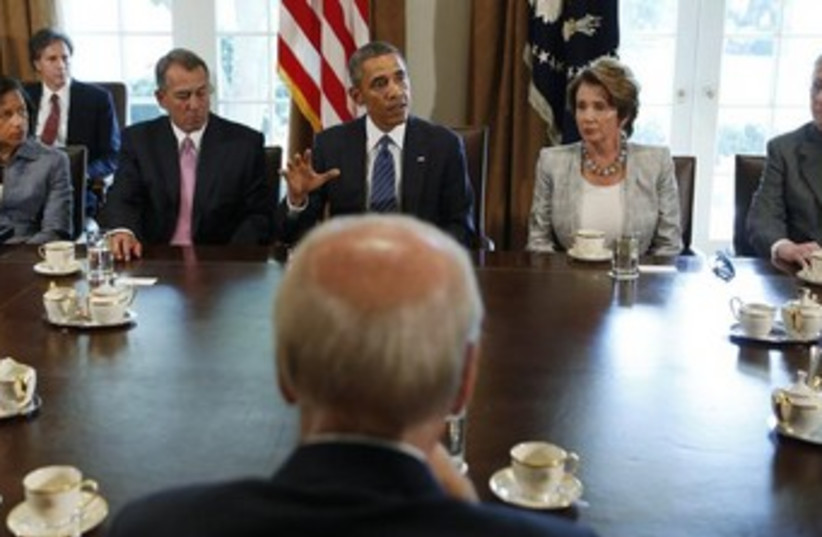 U.S. President Obama (rear C) meets with bipartisan Congress (photo credit: Reuters)