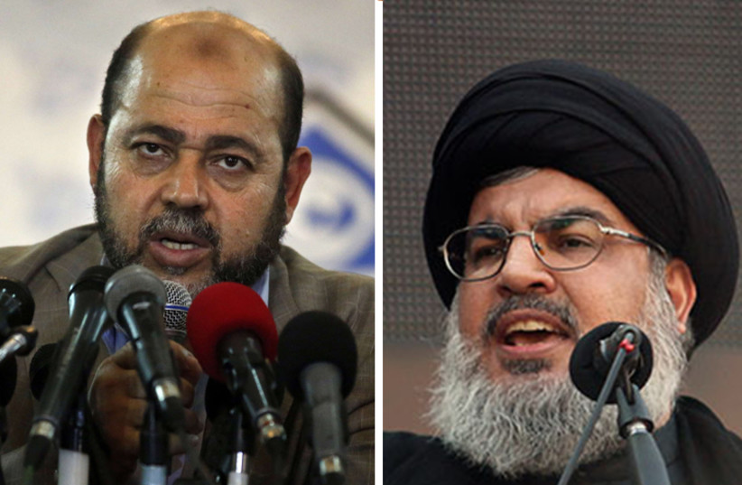 Hezbollah leader Hassan Nasrallah (R) and Hamas deputy political bureau chief Moussa Abu Marzouk‏ (photo credit: REUTERS)