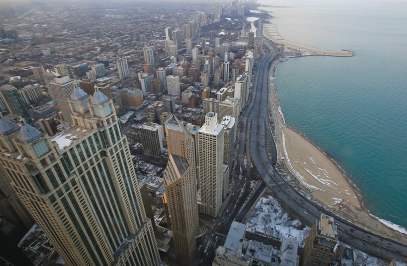 THE DOWNTOWN skyscrapers of Chicago rise against the backdrop of Lake Michigan. (photo credit: REUTERS)