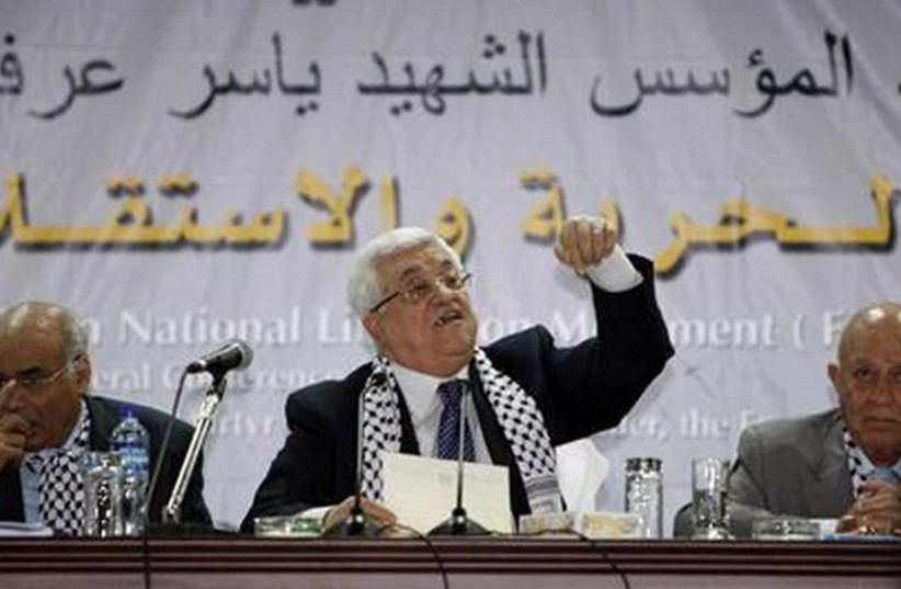 Palestinian Authority President Mahmoud Abbas speaks at a Fatah conference in Ramallah in 2009. (photo credit: REUTERS)