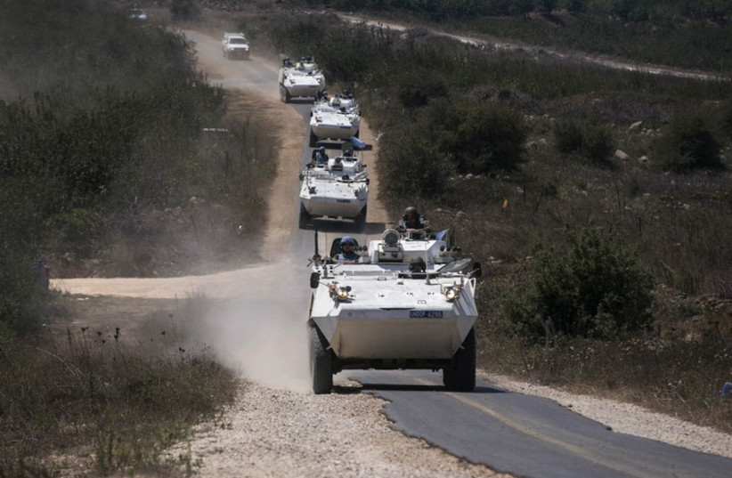 UN Disengagement Observer Force (UNDOF) troops move through Israel’s Golan Heights before crossing into Syria, August 31. (credit: REUTERS/BAZ RATNER)