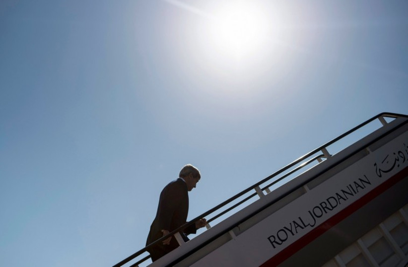 US Secretary of State John Kerry boards his plane in Amman, as he prepares to travel to Saudi Arabia, September 11 (photo credit: REUTERS)