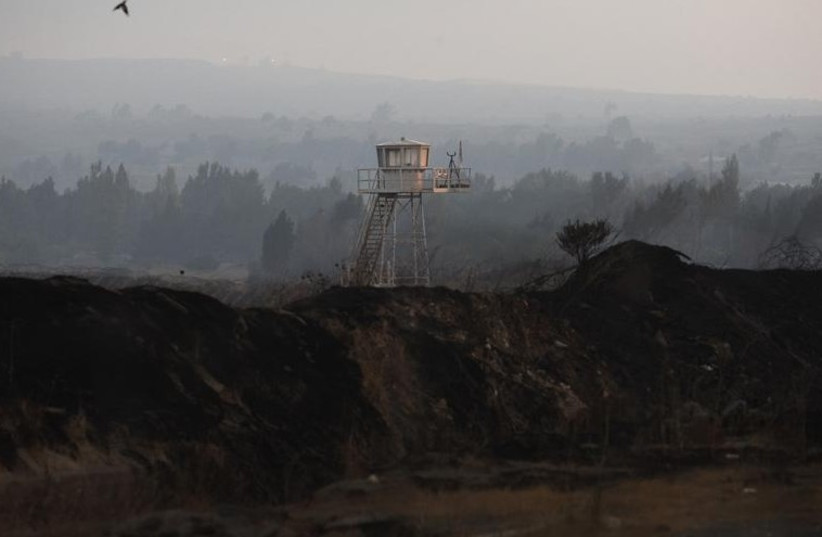  A UN observation tower is seen overlooking Syria, next to the Quneitra border crossing between the Golan Heights in Israel and Syria. (photo credit: REUTERS)