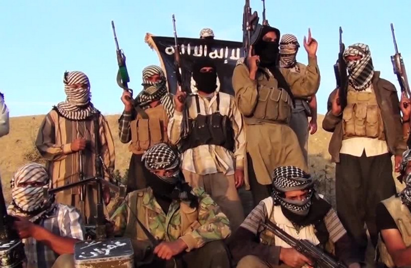 ISIS militants (photo credit: ARAB MEDIA)