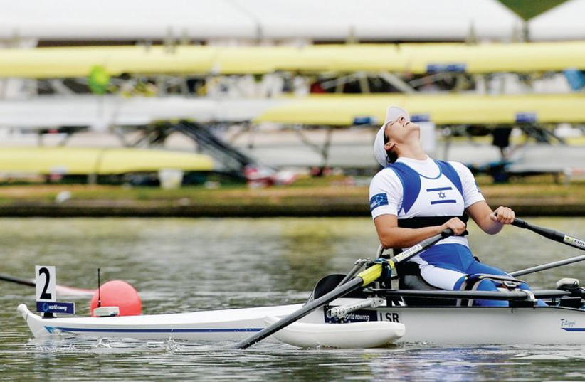 Moran Samuel in a racing boat at the World Championships in Amsterdam. (photo credit: DETLEV SAYEV)