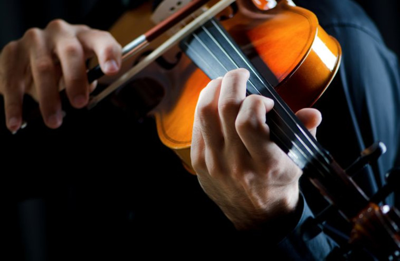 Violin player (illustrative photo) (photo credit: INGIMAGE)