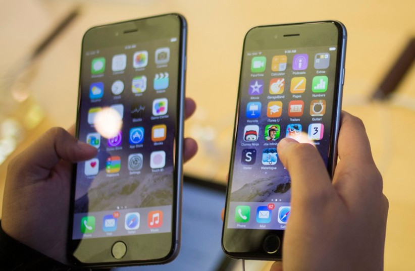 Apple's iPhone 6 (R) and iPhone 6 Plus. (photo credit: REUTERS)