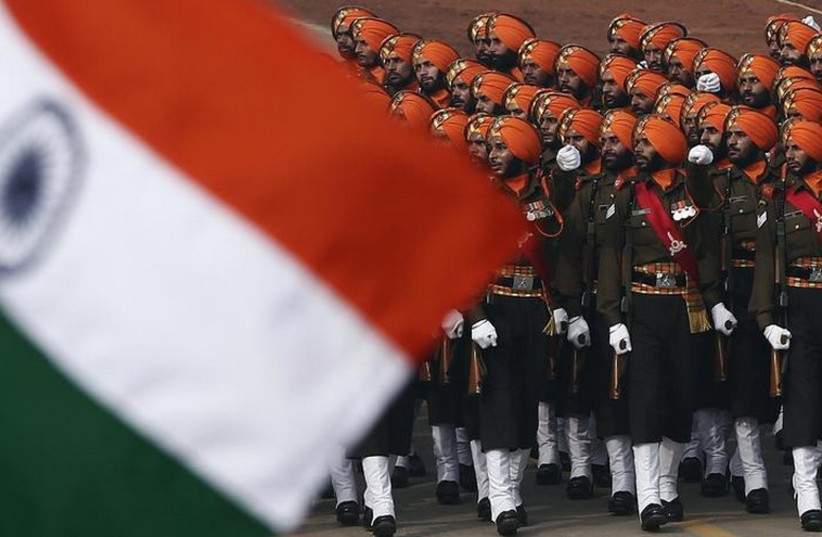 Indian Army soldiers march during the Republic Day parade in New Delhi (photo credit: REUTERS)