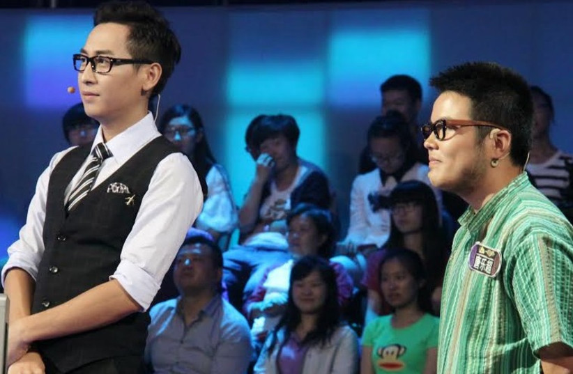  Lechao Tang (right) participating in Chinese game show. (photo credit: CHINA TV)