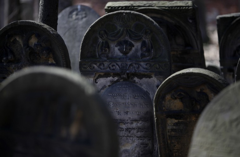 Old gravestones are pictured at the Jewish Cemetery in Warsaw (file) (photo credit: REUTERS)