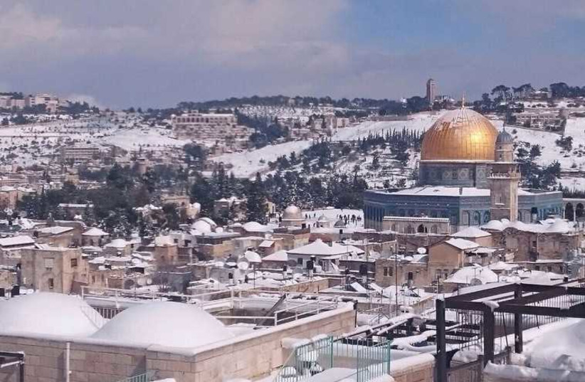 Aerial view of Jerusalem in snow (photo credit: ISRAEL POLICE)