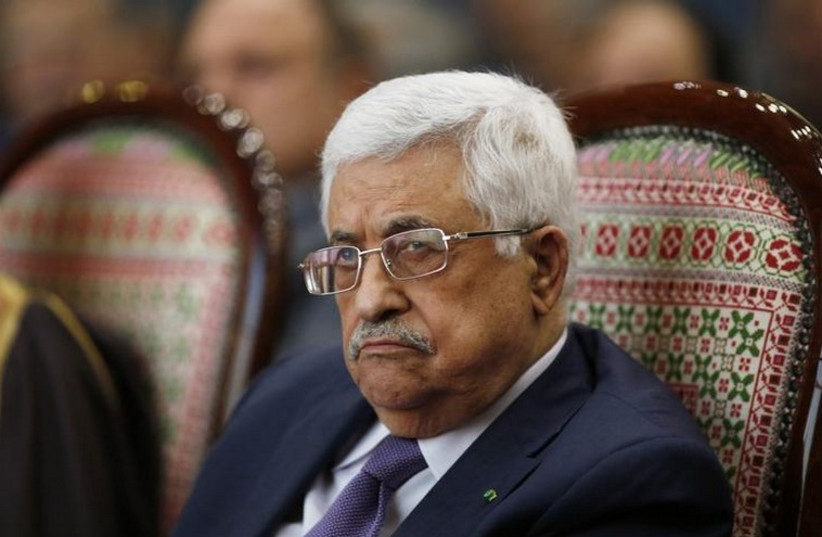 Palestinian Authority President Mahmoud Abbas attends a ceremony in Ramallah (photo credit: REUTERS)