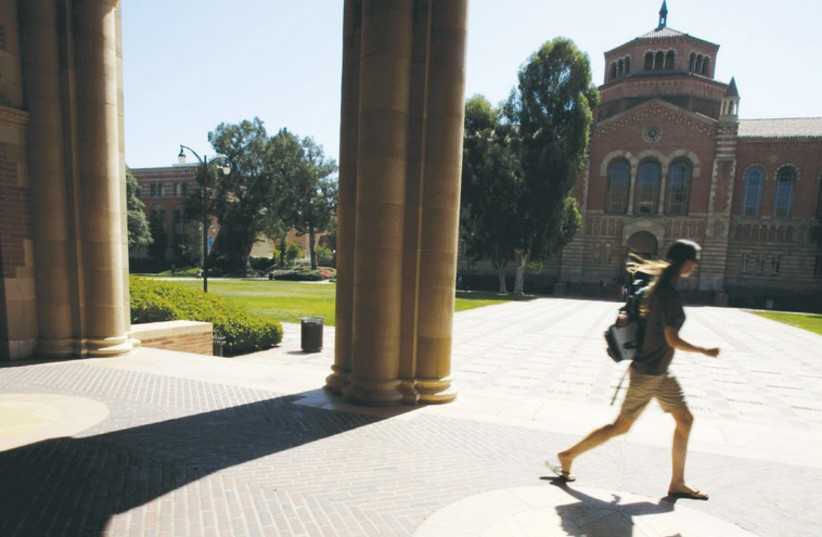 A student walks on the University of California Los Angeles campus. (photo credit: REUTERS)