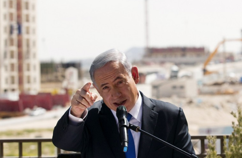 Netanyahu delivers a statement in Har Homa (photo credit: REUTERS)