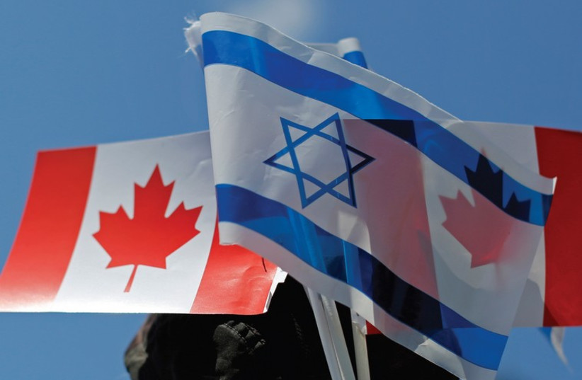 The flags of Israel and Canada
