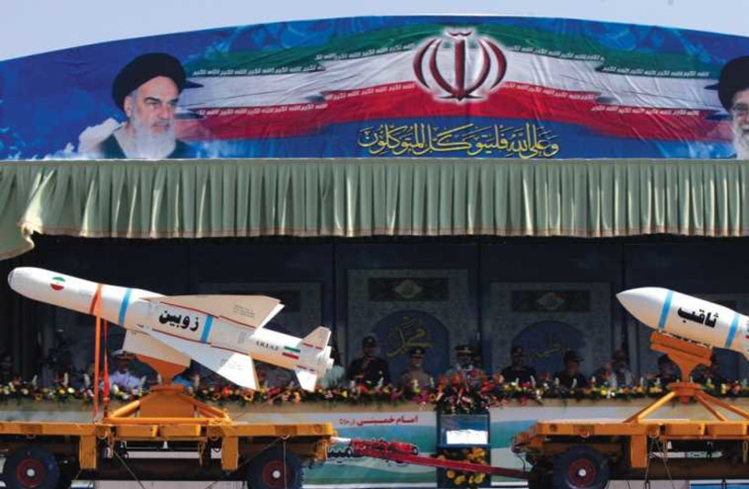Iranian military parade showcasing missiles (photo credit: REUTERS)