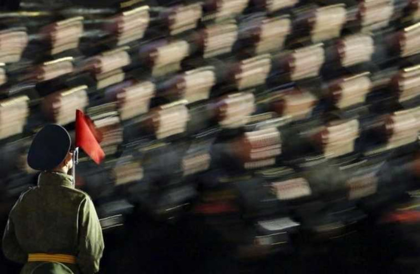 Russian servicemen take part in a rehearsal for the Victory parade on Moscow's Red Square
