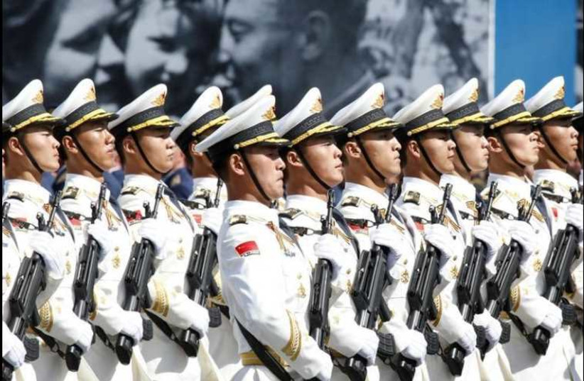 Chinese Army servicemen march during the Victory Day parade at Red Square in Moscow
