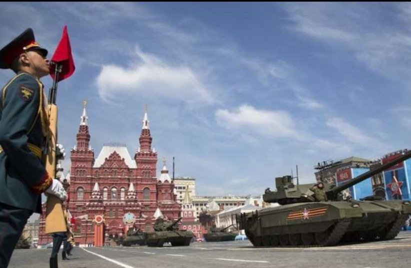 New Russian T-14 Armata tank drives during the Victory Day parade at Red Square in Moscow