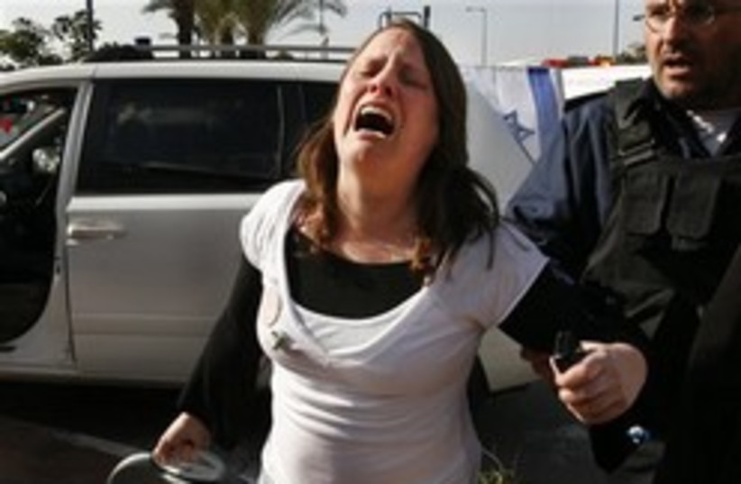 woman screaming sderot good 248.88 (photo credit: AP [file])