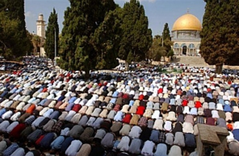 muslims praying 298.88 (photo credit: AP [file])