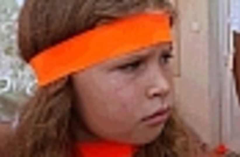 orange headband girl 88 (photo credit: )