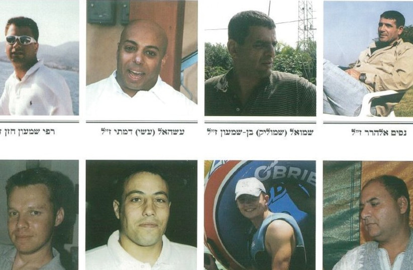 THESE EIGHT MEN were killed on July 16, 2006, when a Hezbollah rocket struck the Haifa train depot. From top left: Rafi Hazan, Asael Damti, Shmuel Ben-Shimon and Nissim Elharrar, and from bottom left: David Feldman, Shlomi Mansoura, Dennis Lapidus and Reuven Levi. (photo credit: ISRAEL RAILWAYS)