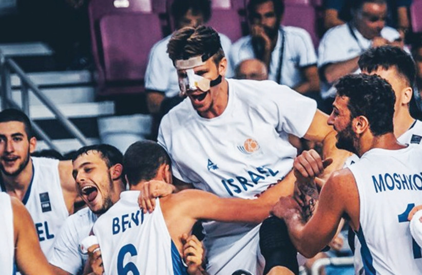 Israel players celebrate yesterday after advancing to the under-20 European Championship final in Crete, Greece. (photo credit: Courtesy)