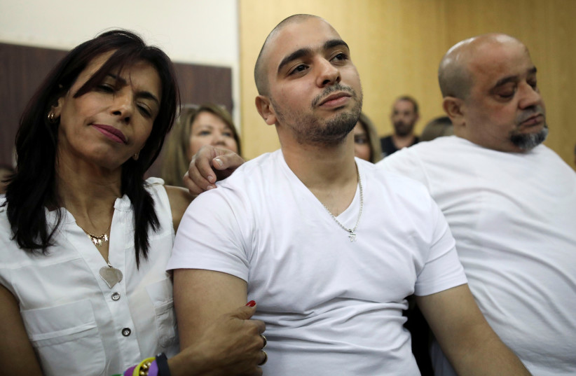 Former Israeli soldier Elor Azaria and his family await a ruling on the appeal of his manslaughter conviction (photo credit: REUTERS/DAN BALILTY)