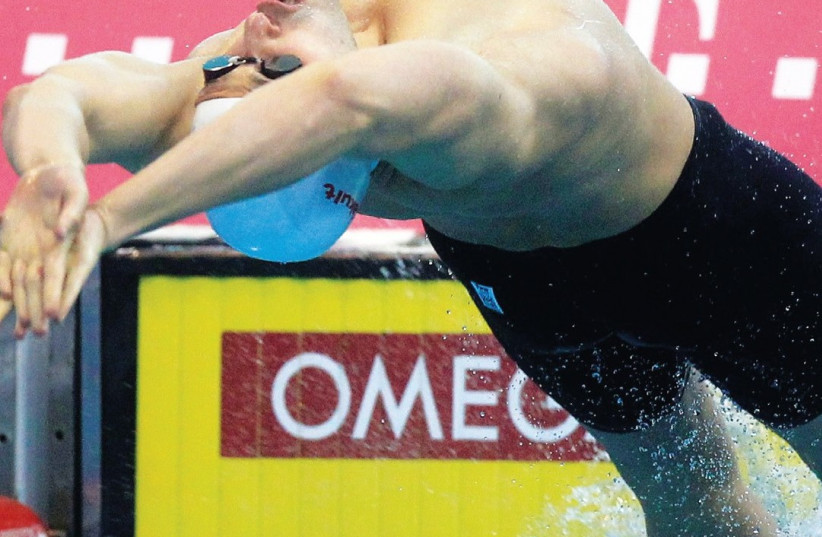 IsraelI SWIMMER Jonatan Kopelev finished eighth in yesterday’s 50-meter backstroke final at the world championships in Budapest (photo credit: REUTERS)