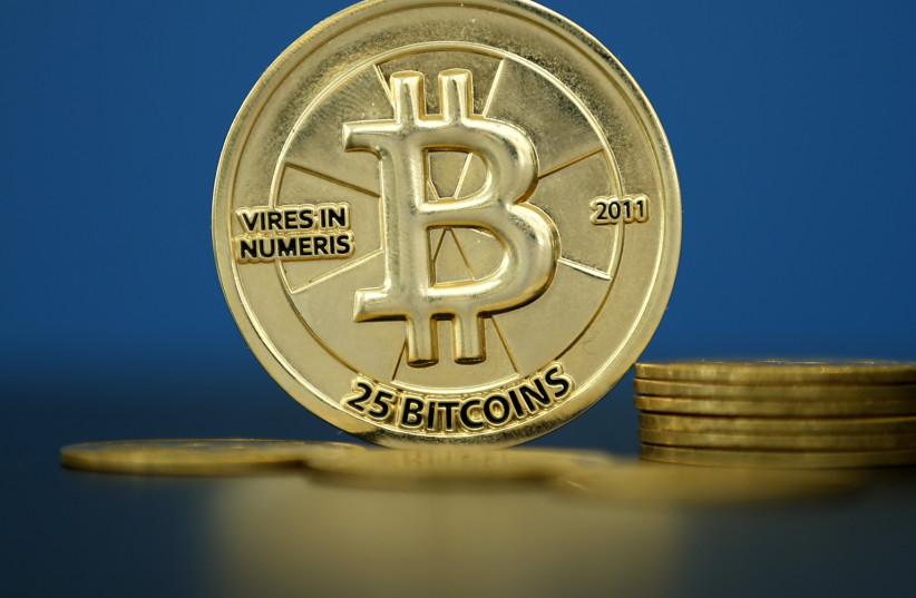 Bitcoin, the world's most famous cryptocurrency (photo credit: BENOIT TESSIER /REUTERS)
