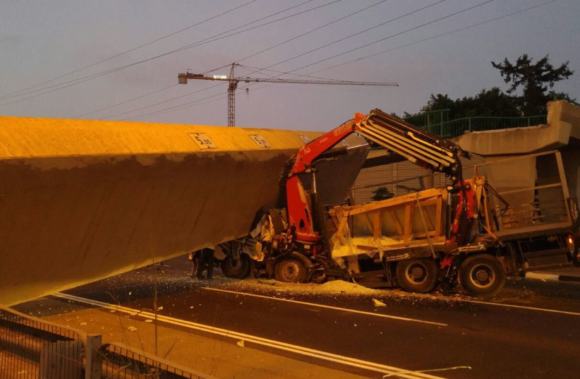 An image from the Monday night pedestrian bridge collapse on Highway 4, between Givat Shmuel and Bnei Brak. (photo credit: COURTESY ISRAEL POLICE)