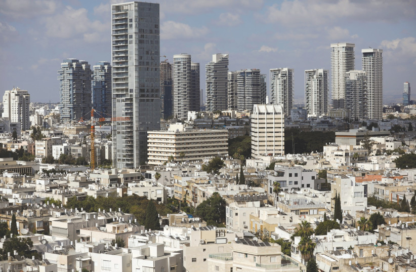 UNAFFORDABLE for some Israelis, no matter how much they work they can’t afford to live well in the country and have considered moving abroad. (photo credit: REUTERS)