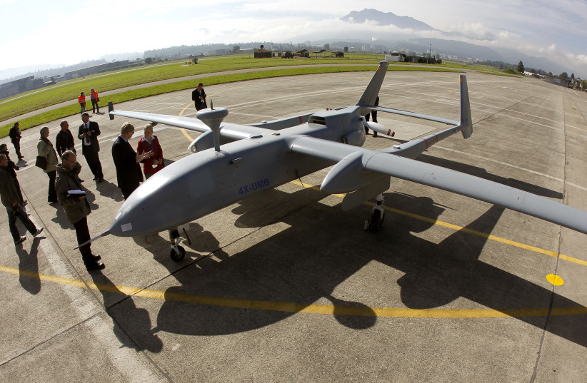 An Israel Aero Space Industries (IAI) Heron 1 unmanned aerial vehicle (UAV) stands on the tarmac during a media presentation at the airbase in the central Swiss town of Emmen September 20, 2012. (photo credit: REUTERS/ARND WIEGMANN)