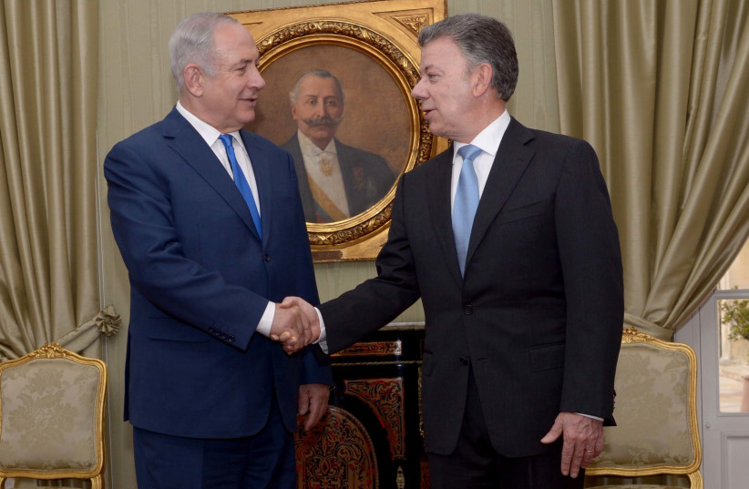 Israeli Prime Minister Benjamin Netanyahu meets with Colombia's President Juan Manuel Santos (photo credit: AVI OHAYON - GPO)