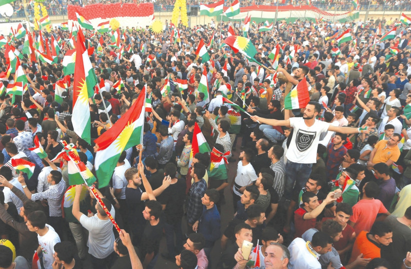 KURDISH PEOPLE attend a rally to show their support for the upcoming September 25th independence referendum in Duhuk, Iraq. (photo credit: REUTERS)