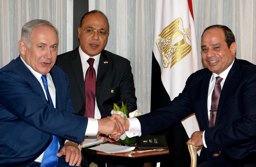 Prime Minister Benjamin Netanyahu meets with Egyptian President al-Sisi in New York.  (photo credit: AVI OHAYON - GPO)
