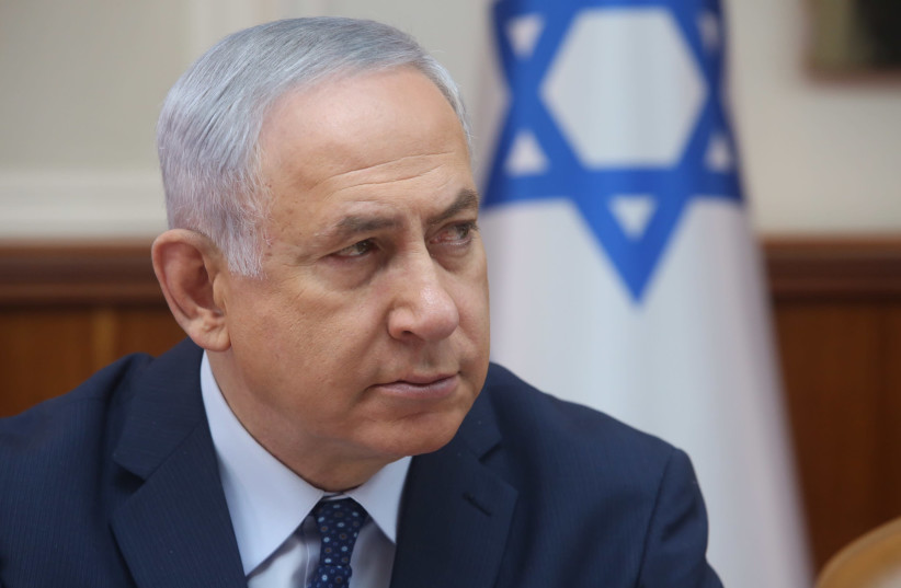 Israeli Prime Minister Benjamin Netanyahu at a cabinet meeting (photo credit: MARC ISRAEL SELLEM)