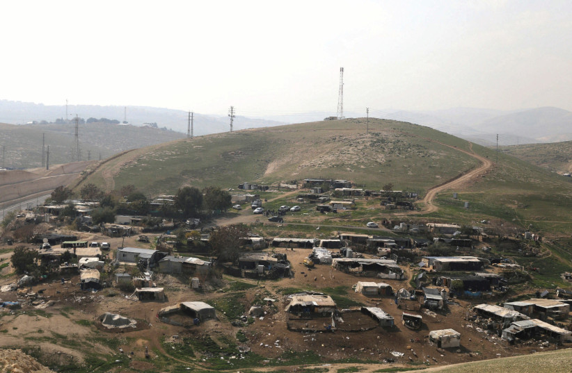 THE BEDUIN encampment of Khan al-Ahmar is seen near Ma’aleh Adumim. (photo credit: AMMAR AWAD / REUTERS)