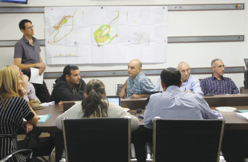 The Higher Planning Council for Judea and Samaria discusses plans on Tuesday to build more homes in the West Bank. (photo credit: TOVAH LAZAROFF)
