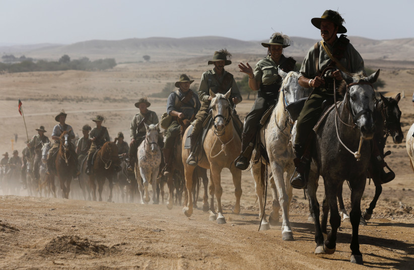 Descendants of soldiers from the Australian and New Zealand Army Corps (ANZAC), ride horses along the trail that their ancestors took as troops when they made their way to Beersheba. (photo credit: REUTERS)