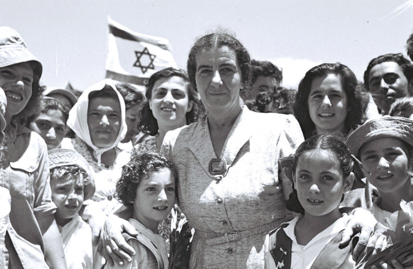 THEN-LABOR minister Golda Meir attends the opening of the Tel Aviv-Netanya highway in July 1950 (credit: TEDDY BRAUNER/GPO)
