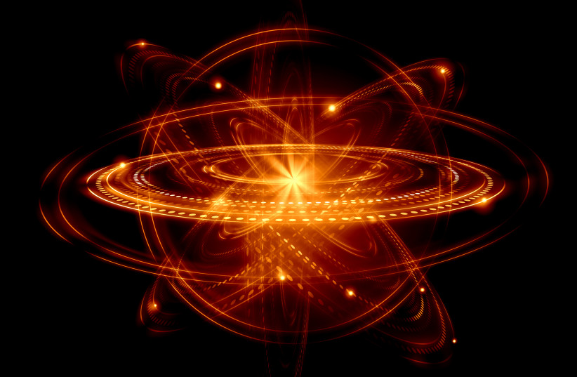 Concept image of an atom and electrons (photo credit: INGIMAGE)