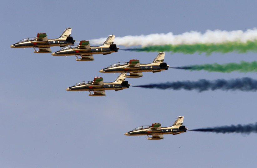 Al Fursan, the UAE Air Force performs during Dubai Airshow. (photo credit: AHMED JADALLAH / REUTERS)