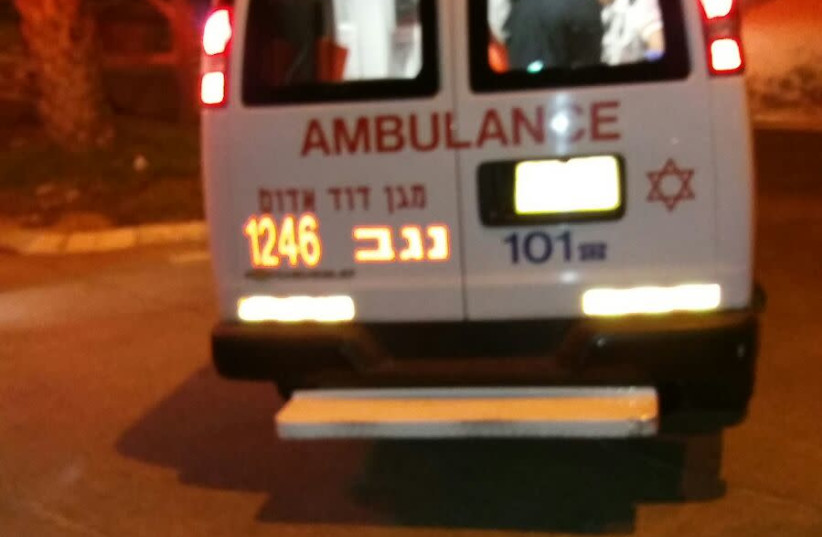 An MDA ambulance leaves the scene of a suspected terror attack in Arad on November 30. (photo credit: MAGEN DAVID ADOM)