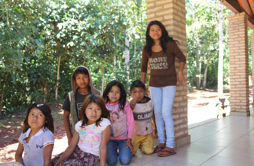 Local Guarani native children outside the Moise Bertoni Museum. (credit: ANNA AHRONHEIM)