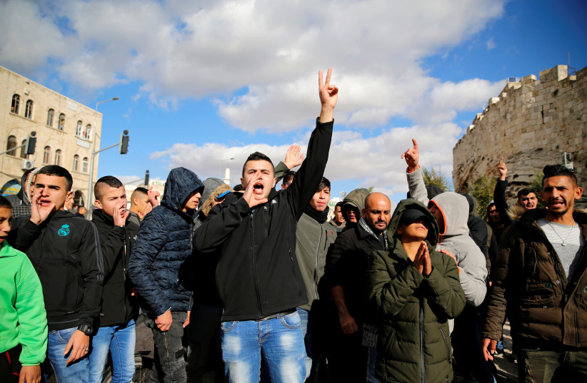 Palestinians in the Old City of Jerusalem shout slogans in protest against US recognition of Jerusalem (photo credit: AMMAR AWAD / REUTERS)